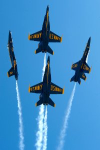 US Navy 100918-N-0092J-227 F-A-18 Hornets assigned to the U.S. Navy flight demonstration squadron, the Blue Angels, fly over Naval Air Station Ocea