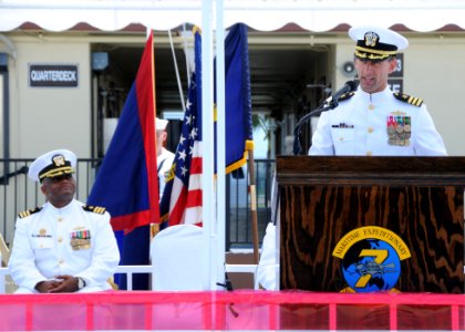 US Navy 100917-N-1906L-006 Cmdr. David Suchyta, right, delivers his remarks to guests at a change of command ceremony