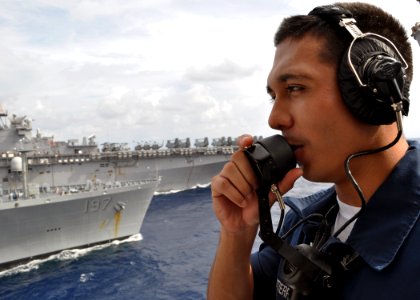 US Navy 101018-N-3620B-055 Yeoman Seaman Jarret Gutierrez stands the bridge-to-bridge phone talker watch aboard the amphibious transport dock ship