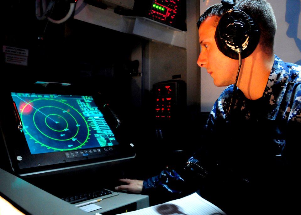 US Navy 101013-N-8913A-064 Operations Specialist Seaman Bradley S. Pool, assigned to the operations department of the aircraft carrier USS George H