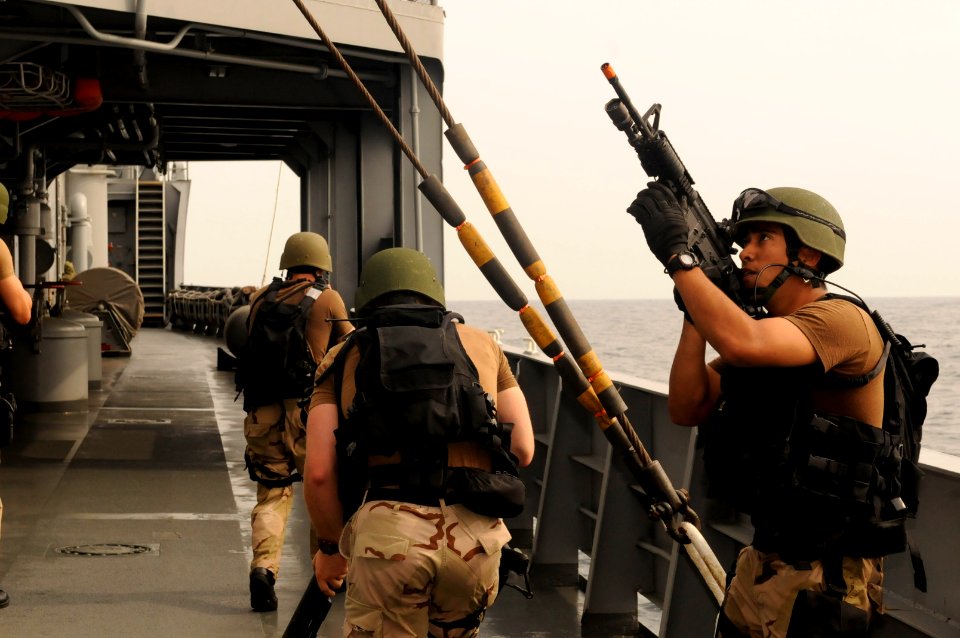 US Navy 101014-N-7478G-300 Fire Controlman 2nd Class Roberto Ruvalcaba, right, assigned to the guided-missile destroyer USS Lassen (DDG 82), partic