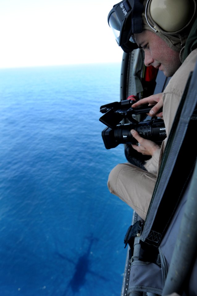 US Navy 101018-N-5016P-277 Mass Communication Specialist 3rd Class Stephen Doyle, assigned to the guided-missile cruiser USS Cape St. George (CG 71
