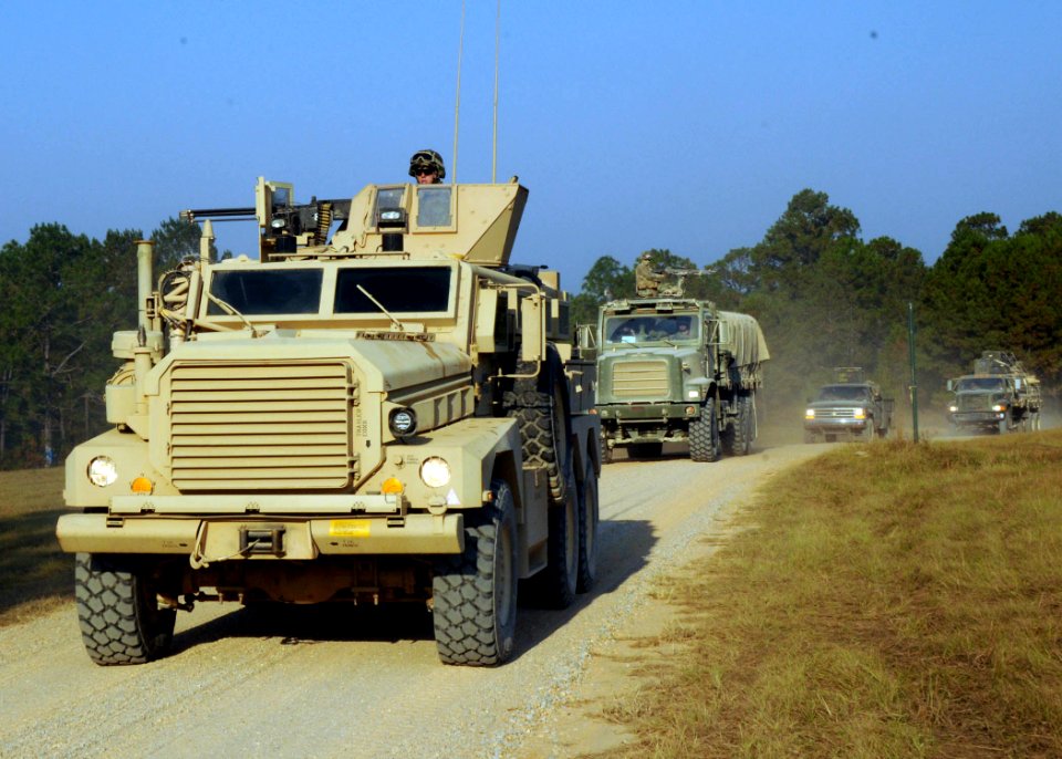 US Navy 101014-N-4440L-145 Convoy Security Element Team 2 and the air detail of Naval Mobile Construction Battalion (NMCB) 74 arrive at their camp