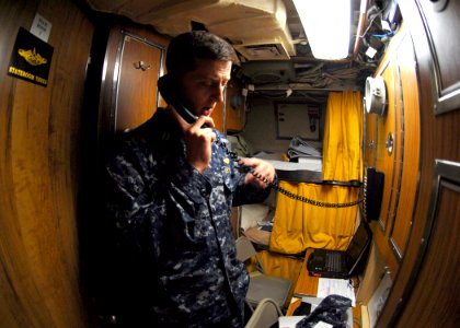 US Navy 101013-N-7705S-023 Lt. Jonathan Marta, assistant weapons officer for the Los Angeles-class attack submarine USS Norfolk (SSN 714) briefs th