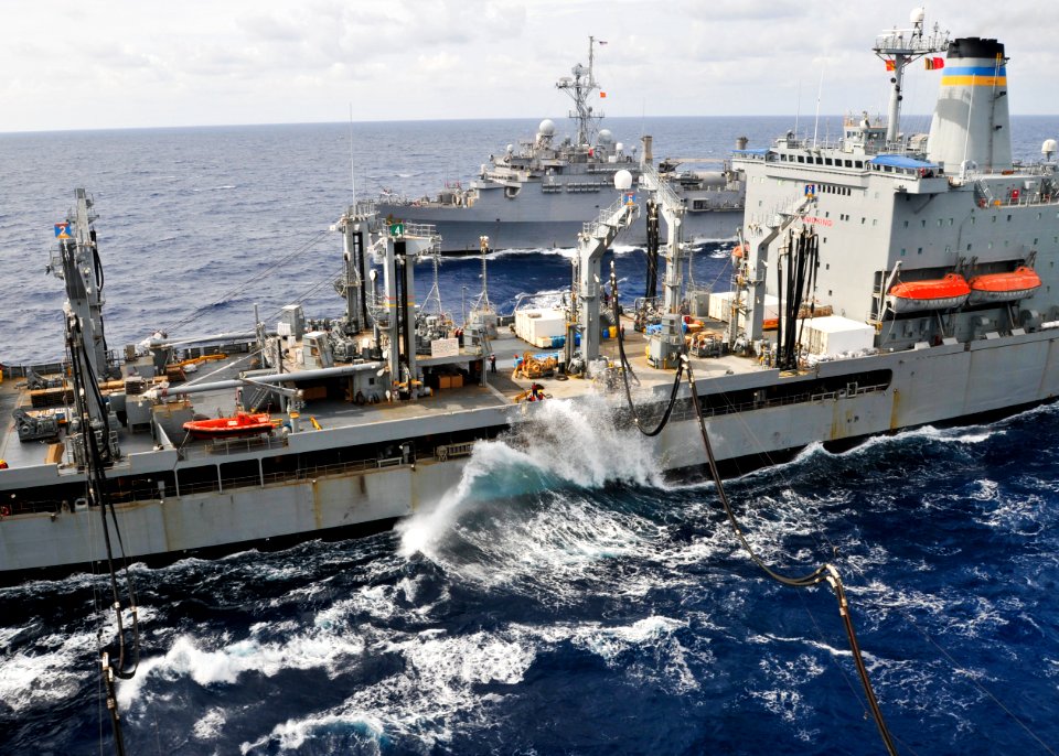 US Navy 101018-N-9950J-283 The Military Sealift Command fleet replenishment oiler USNS Pecos (T-AO 197) conducts an underway replenishment with the