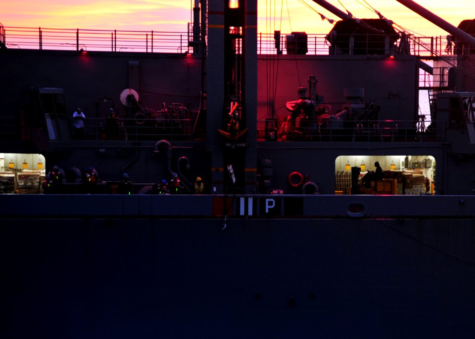 US Navy 101014-N-1287L-020 Personnel aboard the Military Sealift Command fast combat support ship USNS Arctic (T-AOE 8) prepare cargo before a repl