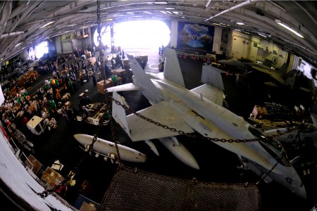 US Navy 101014-N-7103C-209 More than 60,000 pounds of mail are sorted in the Hangar bay of the aircraft carrier USS George Washington (CVN 73)