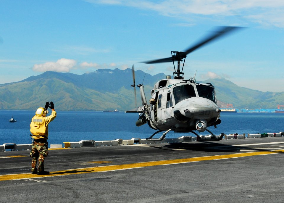 US Navy 101016-N-2218S-035 A UH-N1 Huey helicopter assigned to Marine Medium Helicopter Squadron (HMM) 262 lands aboard the amphibious assault ship