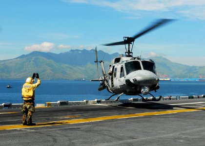 US Navy 101016-N-2218S-035 A UH-N1 Huey helicopter assigned to Marine Medium Helicopter Squadron (HMM) 262 lands aboard the amphibious assault ship photo