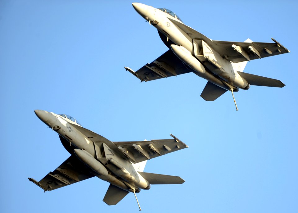 US Navy 101015-N-0569K-026 Two F-A-18F Super Hornets assigned to the Red Rippers of Strike Fighter Squadron (VFA) 11 fly i