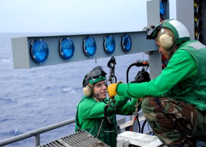 US Navy 101016-N-8721D-023 Interior Communications Electrician Fireman Jaron Brown, left, from Fresno, Calif., and Interior Communications Electric