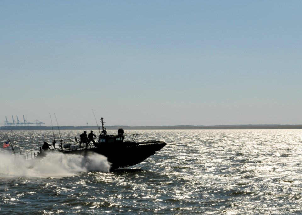 US Navy 101021-N-5085J-239 Sailors assigned to Riverine Group 1 conduct maneuvers aboard Riverine Command Boat (Experimental) (RCB-X) at Naval Stat