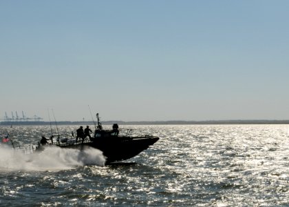 US Navy 101021-N-5085J-239 Sailors assigned to Riverine Group 1 conduct maneuvers aboard Riverine Command Boat (Experimental) (RCB-X) at Naval Stat