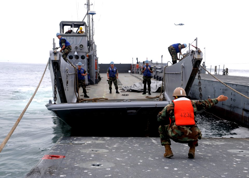 US Navy 101018-N-8959T-170 Sailors assigned to Amphibious Construction Battalion (ACB) 1 and Expeditionary Warfare Training Group Pacific moor Land