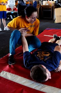 US Navy 101022-N-3852A-148 Sailors assigned to the aircraft carrier USS George H.W. Bush (CVN 77) practice takedown procedures during a Security Re