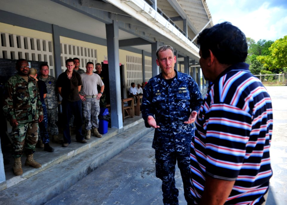 US Navy 101019-N-1531D-109 Capt. Thomas Negus, commodore of Continuing Promise 2010, thanks the mayor of Orealla Guyana during a Continuing Promise photo