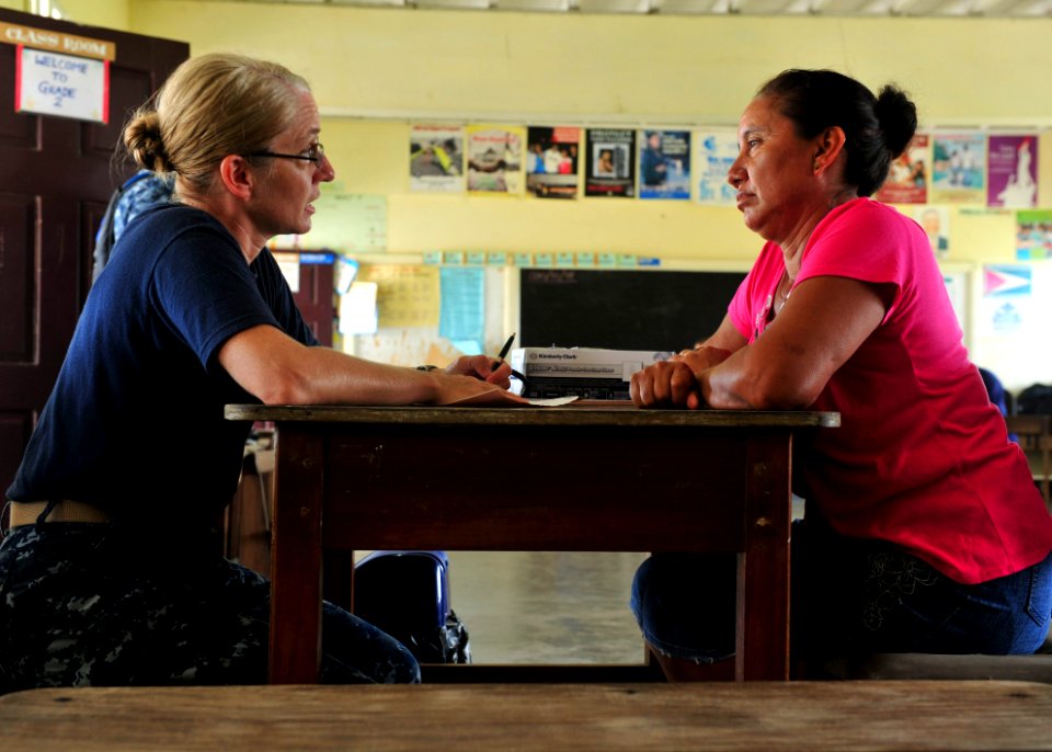 US Navy 101019-N-1531D-030 Cmdr. Dixie Aune discusses women's health during a Continuing Promise 2010 medical civic action program