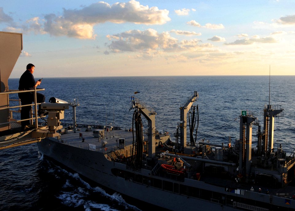 US Navy 101022-N-3737T-079 Capt. William B. Seaman, chief of staff for Carrier Strike Group (CSG) 2, communicates with the battle captain from the