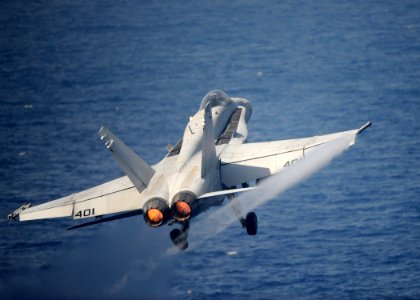 US Navy 101020-N-1261P-023 An F-A-18C Hornet assigned to the Blue Blasters of Strike Fighter Squadron (VFA) 34 launches from the aircraft carrier U