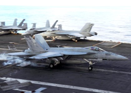 US Navy 101020-N-1004S-037 An F-A-18E Super Hornet assigned to the Argonauts of Strike Fighter Squadron (VFA) 147 lands aboard the aircraft carrier