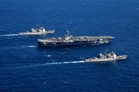 US Navy 101022-N-4154B-397 The aircraft carrier USS George H.W. Bush (CVN 77), and the guided-missile cruisers USS Philippine Sea (CG 58) and USS G