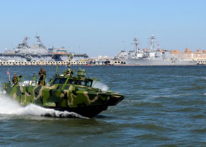 US Navy 101021-N-5085J-500 Sailors assigned to Riverine Group 1 conduct maneuvers aboard Riverine Command Boat (Experimental) (RCB-X) at Naval Stat