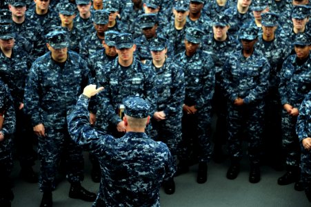 US Navy 101022-N-75266-150 Master Chief Petty Officer of the Navy (MCPON) Rick D. West addresses more than 150 Sailors during an all-hands call abo