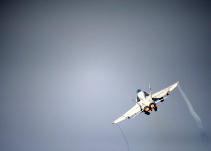 US Navy 101020-N-1261P-004 An F-A-18C Hornet assigned to the Blue Blasters of Strike Fighter Squadron (VFA) 34 launches from the aircraft carrier U