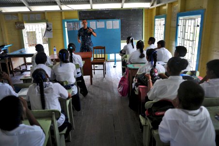 US Navy 101021-N-9964S-149 Lt. Mike Kavanaugh speaks to school children about mosquitoes that carry infectious disease in Guyana during a continuin photo