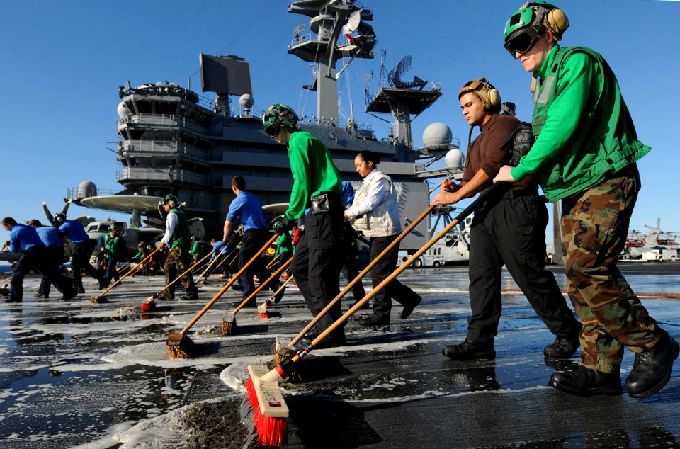 US Navy 101022-N-2686K-281 Sailors aboard the aircraft carrier USS George H.W. Bush (CVN 77) participate in a scrub exercise on the ship's flight d