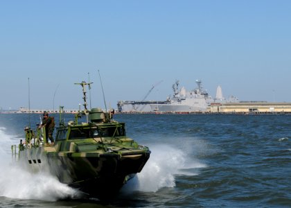 US Navy 101021-N-5085J-383 Sailors assigned to Riverine Group 1 conduct maneuvers aboard Riverine Command Boat (Experimental) (RCB-X) at Naval Stat