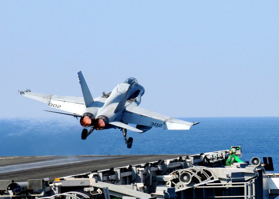 US Navy 101021-N-6632S-050 An F-A-18C Hornet assigned to Strike Fighter Squadron (VFA) 15 launches from the aircraft carrier USS George H.W. Bush (