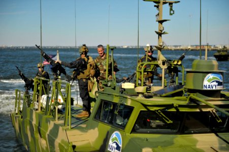 US Navy 101022-N-6889J-392 Rear Adm. Michael P. Tillotson, commander of Navy Expeditionary Command, thanks Sailors assigned to Riverine Group 1 for