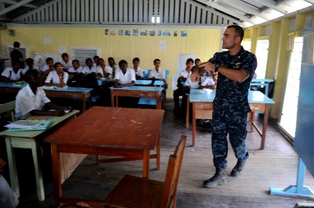US Navy 101021-N-9964S-129 Lt. Mike Kavanaugh speaks to school children about mosquitoes that carry infectious disease in Guyana during a continuin photo