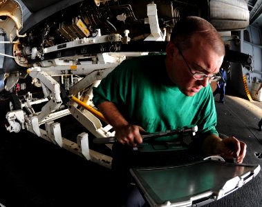 US Navy 101026-N-3793B-242 Aviation Machinist's Mate Brian Monick, from Waterford, Mich., assigned to the Gunslingers of Strike Fighter Squadron (V