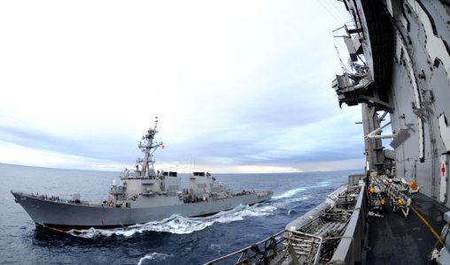US Navy 101026-N-8721D-024 The Arleigh Burke-class guided-missile destroyer USS Stethem (DDG 63) pulls alongside the aircraft carrier USS George Wa photo