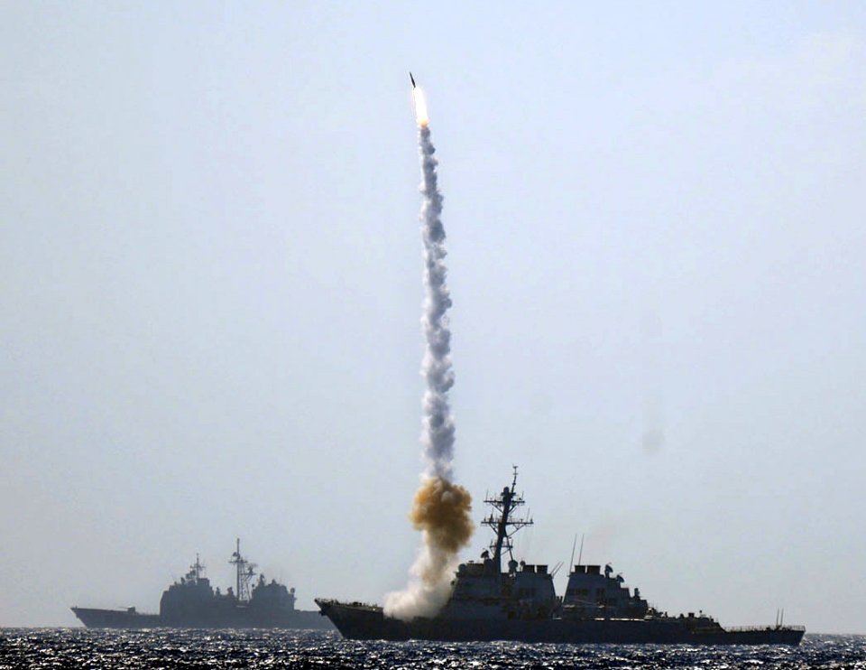 US Navy 101026-N-3885H-116 The guided-missile destroyer USS Mitscher (DDG 57) fires a standard missile 2 (SM-2) during a sinking exercise in the At