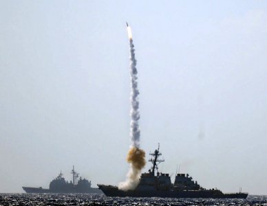 US Navy 101026-N-3885H-116 The guided-missile destroyer USS Mitscher (DDG 57) fires a standard missile 2 (SM-2) during a sinking exercise in the At