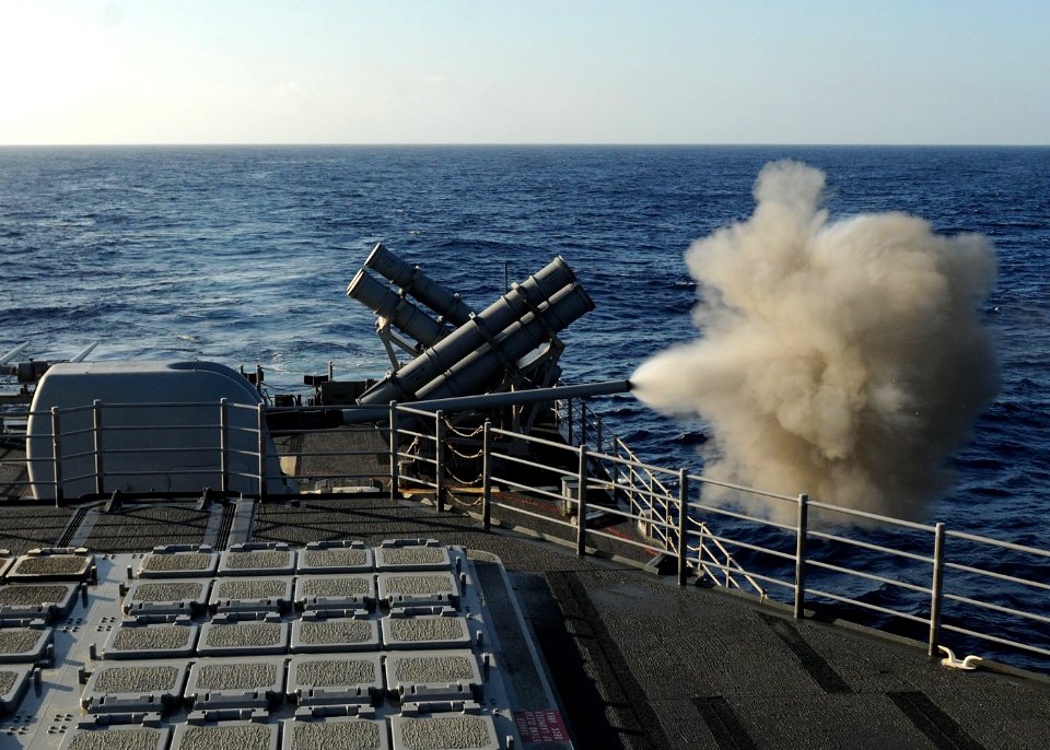 US Navy 101027-N-3374C-032 The guided-missile cruiser USS Gettysburg (CG 64) fires its aft 5-inch Mark 45-54-caliber lightweight gun at the ex-USNS