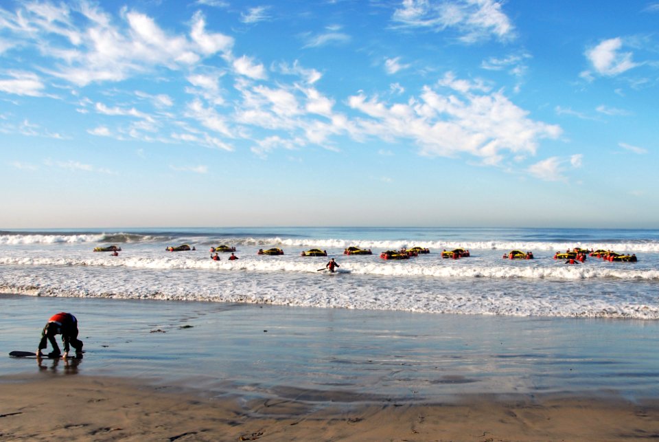 US Navy 101027-N-7883G-048 Students from Basic Underwater Demolition-SEAL (BUD-S) class 286 participate in a surf passage training exercise at Nava