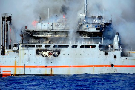 US Navy 101027-N-8913A-382 The ex-USNS Saturn suffers extensive damage and is ablaze during a sinking exercise