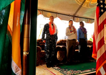 US Navy 101026-N-1531D-241 Capt. Thomas Negus, left, commodore of Continuing Promise 2010, and the Prime Minister of Guyana Samuel Hinds stand at a photo