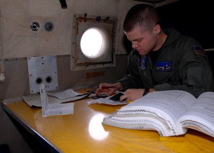US Navy 101028-N-8623S-019 Naval Air Crewman (Mechanical) 2nd Class J.J. Schumacher, a P-3 Orion assistant flight engineer assigned to Patrol Squad
