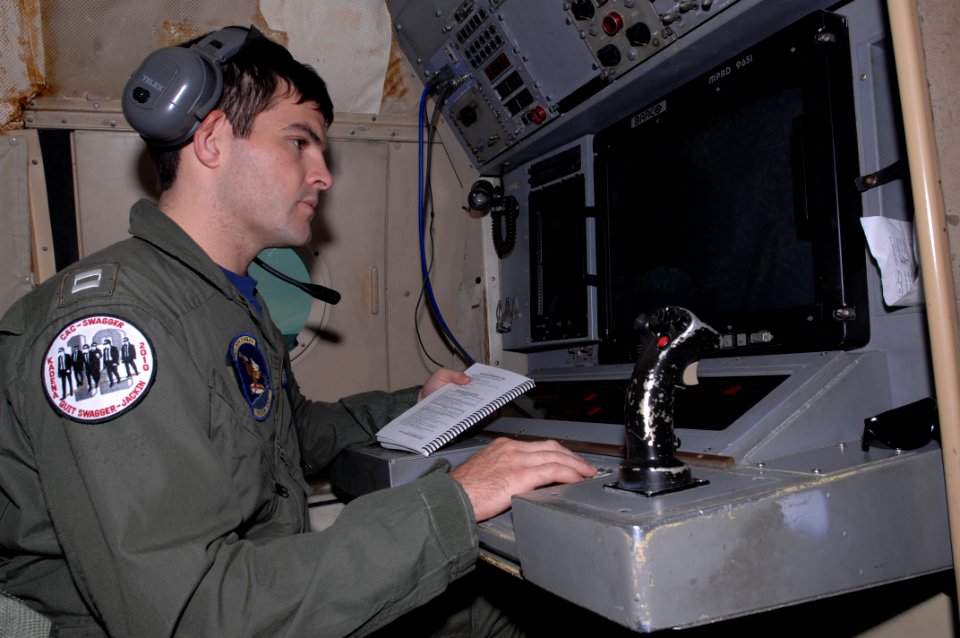 US Navy 101028-N-8623S-041 Lt. Sean O'Neill, tactical coordinator of Patrol Squadron (VP) 9, performs a sonobuoy continuity check during a prefligh