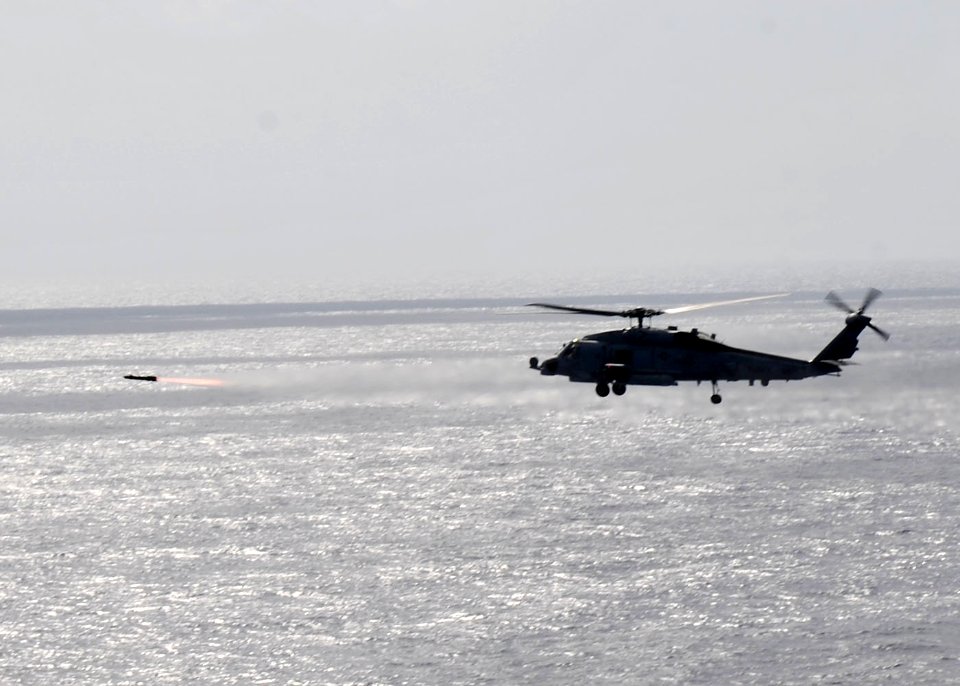US Navy 101026-N-3374C-225 An MH-60R Sea Hawk helicopter assigned to Helicopter Maritime Strike Squadron (HSM) 70