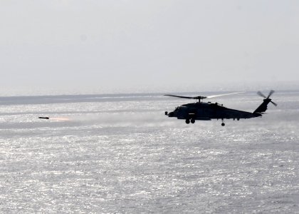 US Navy 101026-N-3374C-225 An MH-60R Sea Hawk helicopter assigned to Helicopter Maritime Strike Squadron (HSM) 70