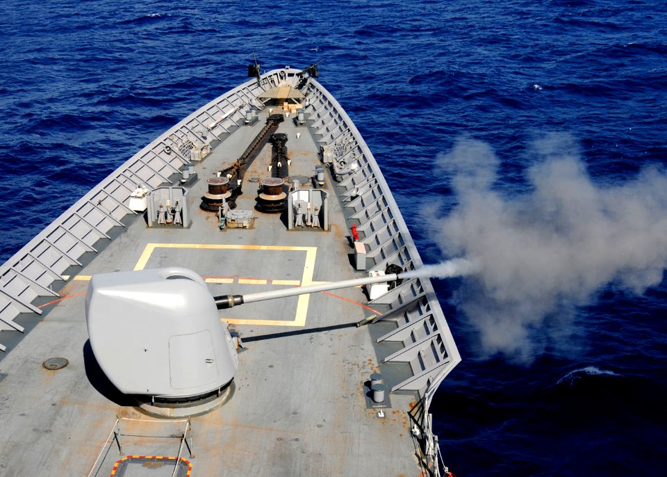 US Navy 101026-N-6632S-263 The guided-missile cruiser USS Gettysburg (CG 64) fires its forward 5-inch Mark 45-54-caliber lightweight gun during a p