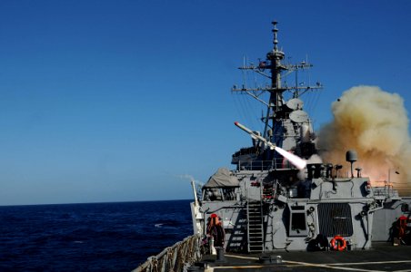 US Navy 101027-N-1854W-035 The guided-missile destroyer USS Mitscher (DDG 57) launches a Harpoon anti-ship missile at the ex-USNS Saturn during a s