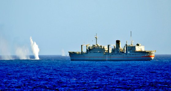 US Navy 101026-N-8913A-794 Rounds from the 5-inch Mark 45-54-caliber lightweight gun aboard the guided-missile destroyer USS Mitscher (DDG 57) impa