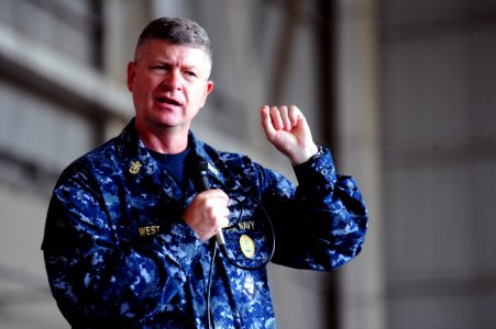 US Navy 101026-N-7526R-214 Master Chief Petty Officer of the Navy (MCPON) Rick D. West answers questions from Sailors during an all-hands call at N